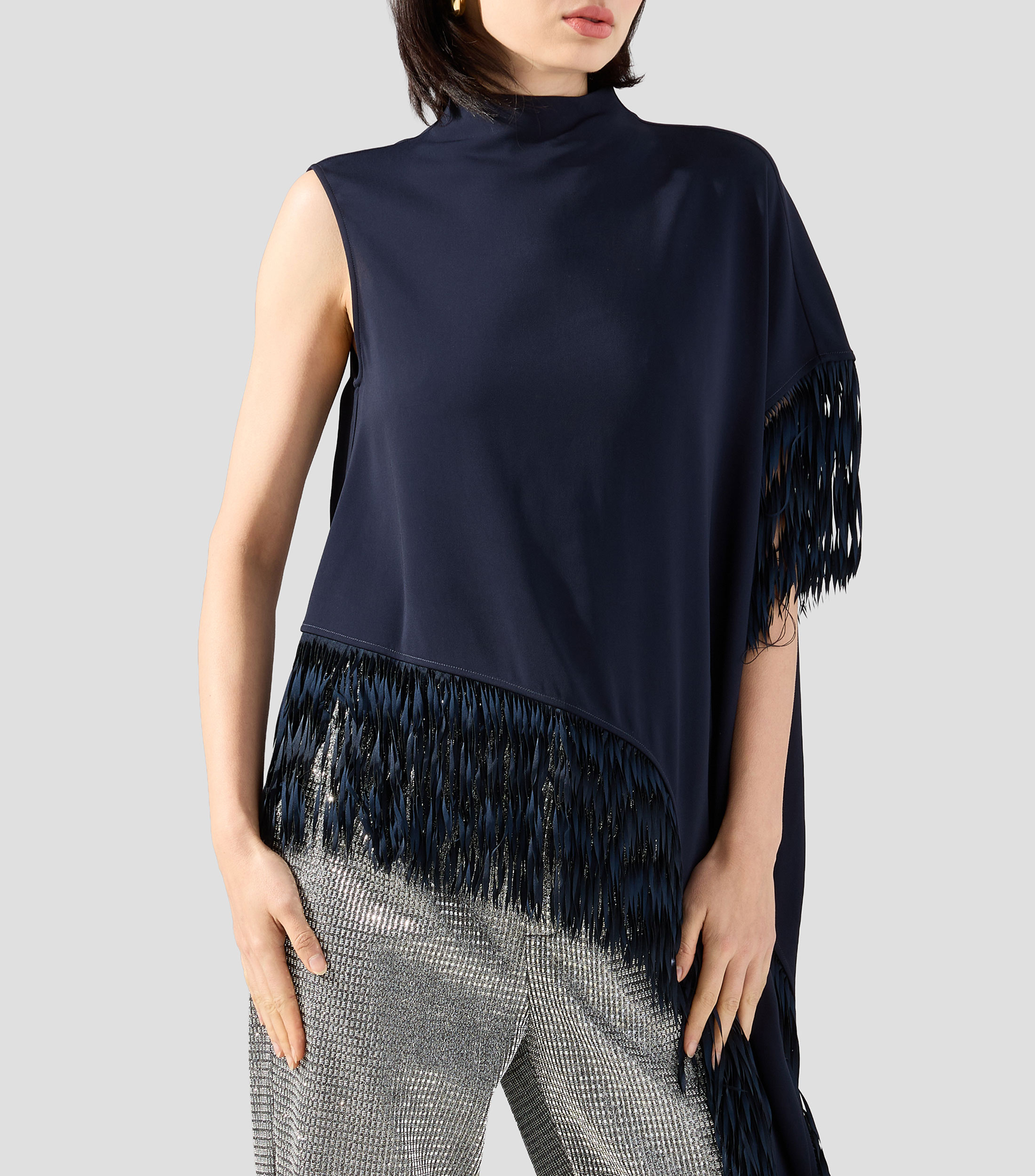 Blusa lisa sin mangas Mujer
